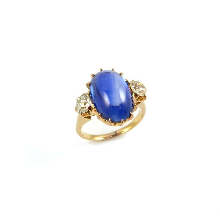 Early 20th century cabochon sapphire and diamond three stone ring